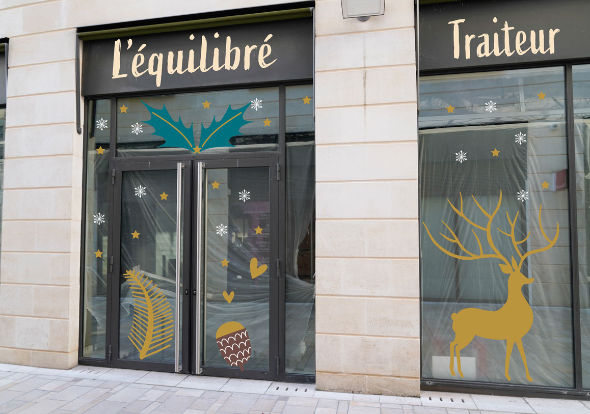 Habillage vitrine de Noël en vitrophanie
